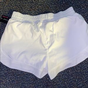 NEVER WORN white athletic shorts. Size small